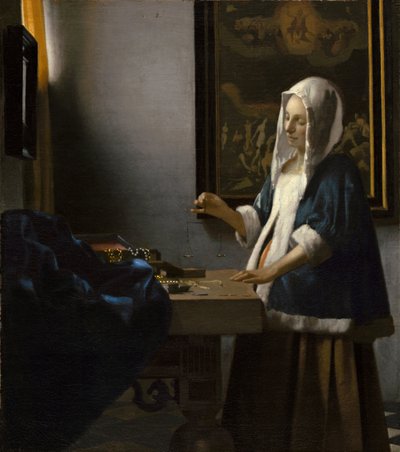 Woman Holding a Balance by Jan Vermeer van Delft